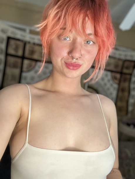 ebony bbw in pink flashes her big tits porn images